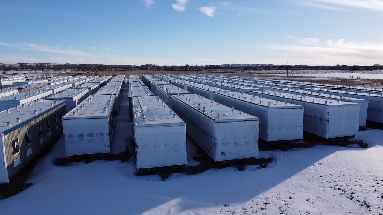Yard — long rows of new units, winter, wide angle
